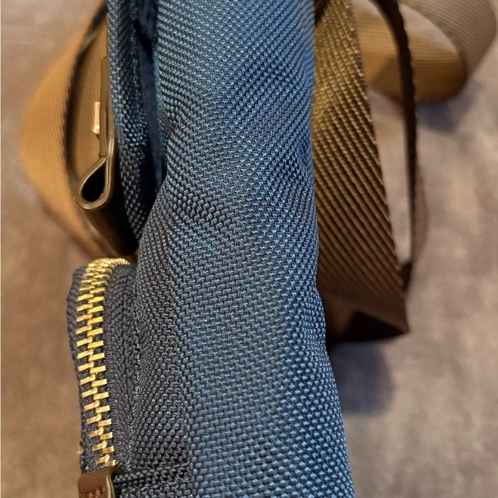 Tumi Blue Messenger Bag with Brown Trim